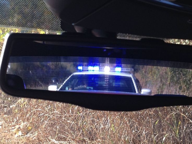 Blue lights in the rearview
